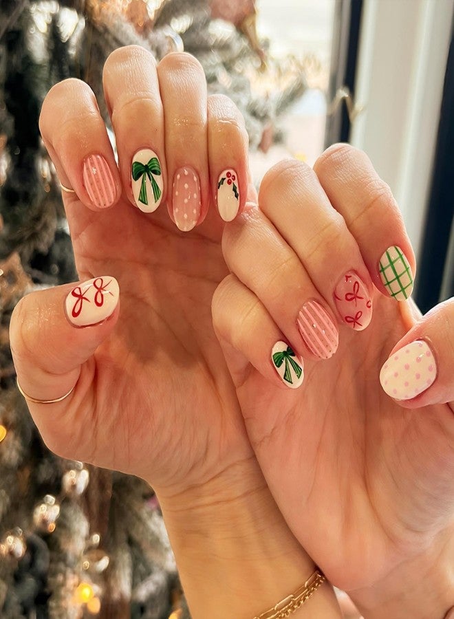 Sevgob Christmas Press on Nails Short Almond Fake Nails with Cute Red Green Bow Design Glossy Round Dot Nail Press ons Holly Fruit Glue on Nail Winter Xmas Holiday Christmas Nails for Women Manicure 24Pcs - Image 1